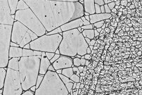 Detail of AG1078 where a polygonal crack network and partial delamination of the object are visible (photo, digital microscopy, Keyence VHX 6000 x 50 magnification)