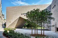 Museum courtyard with view of new building