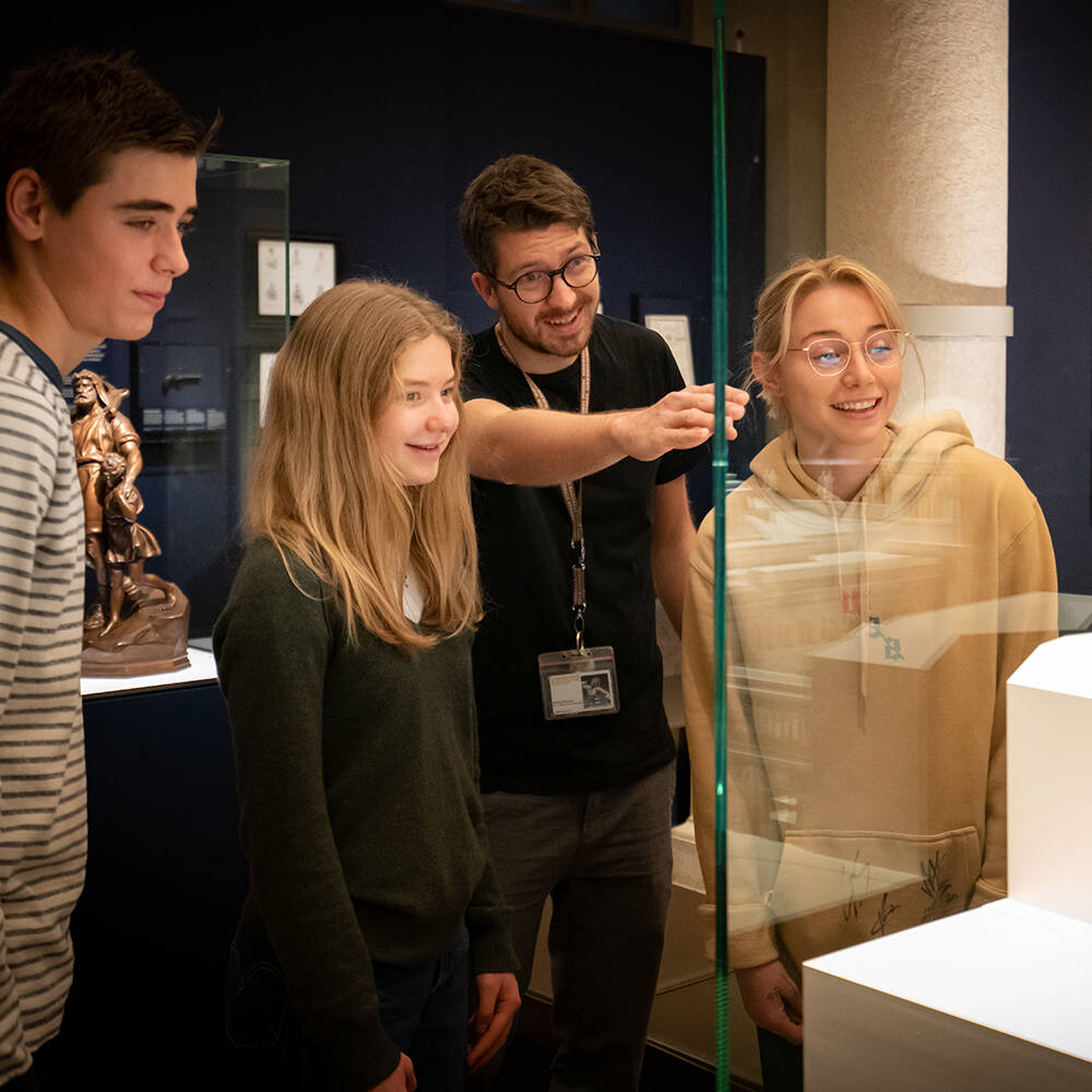 Pupils with a facilitator during a guided tour.